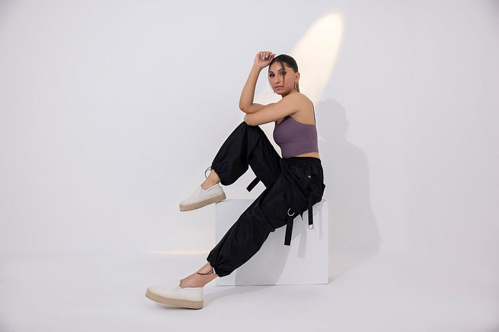 Women's black parachute cargo pants.