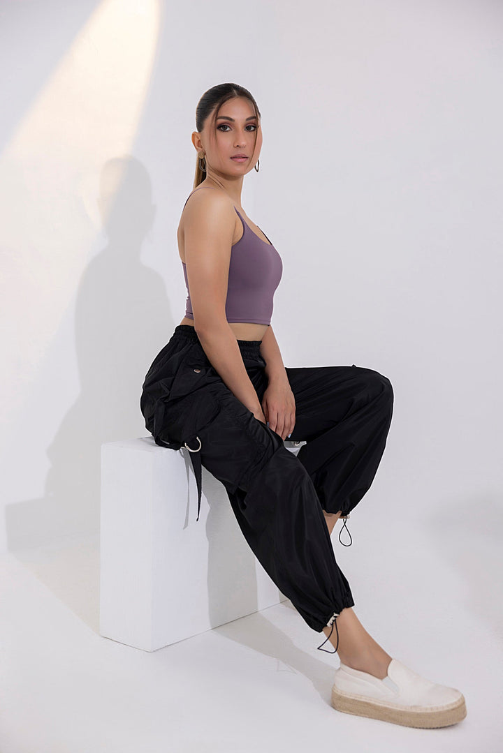 Women's black parachute cargo pants.