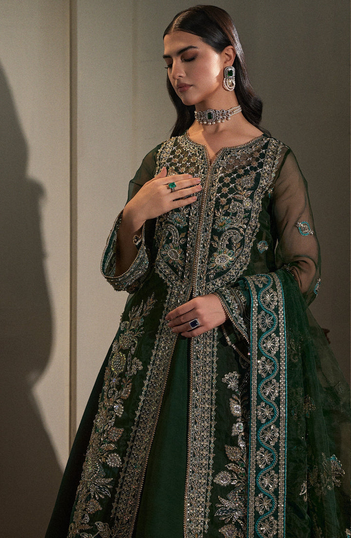 Emerald green cocktail dress worn outdoors, showcasing its versatility for both daytime and evening events By fabiha fatima