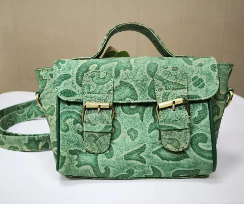 Close‑up of premium leather handbag flap detail