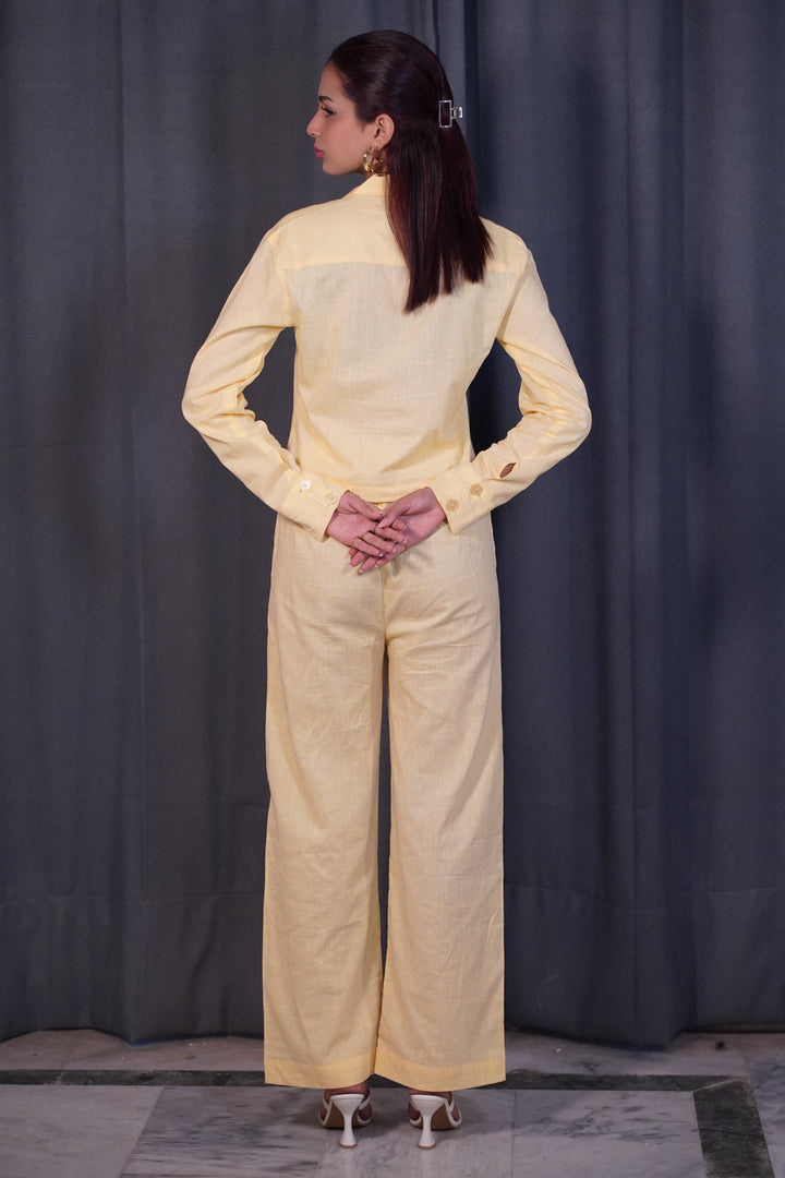 Back view of Solivana yellow co-ord set highlighting straight fit and soft breathable fabric
