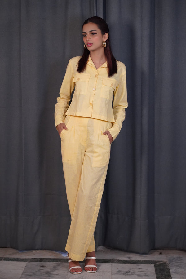 Front view of Solivana Pocket Co-Ord Set in yellow with collared shirt, chest pockets, and regular fit trousers